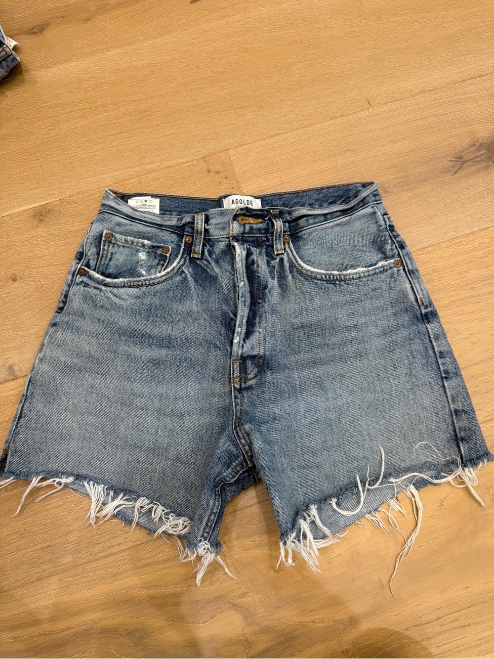Agolde Light Blue Frayed Hem Denim Shorts